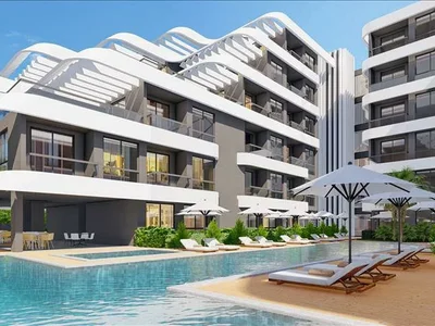 Жилой комплекс Новая резиденция с бассейном, спа-центром и собственным пляжем рядом с аэропортом, Алания, Турция