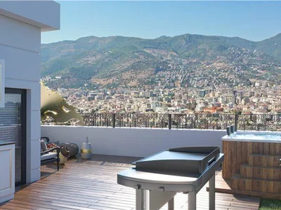 Zespół mieszkaniowy New residence with a swimming pool, lounge areas and a cinema at 300 meters from the beach, Alanya, Turkey