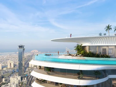 Zespół mieszkaniowy Como Residences — tall residential complex by Nakheel with artificial lakes and sandy beach in Palm Jumeirah, Dubai