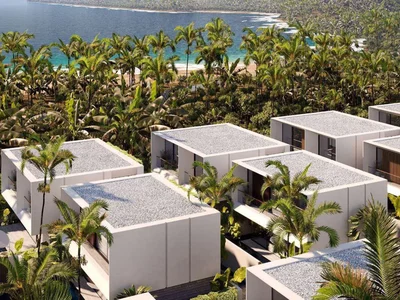 Zespół mieszkaniowy New residential complex of villas and apartments on the ocean shore in Nusa Dui, Bali, Indonesia