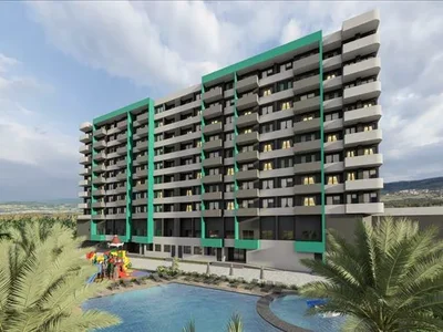 Residential complex New residence with a swimming pool and an underground parking at 550 meters from the sea, Mersin, Turkey