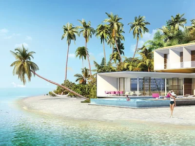 Residential complex German style villas next to the beach and lagoon, The World Islands, Dubai, UAE