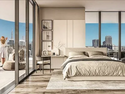 Residential complex High-rise residence Vento Tower with a swimming pool and a co-working area in the center of Dubai, Business Bay, UAE