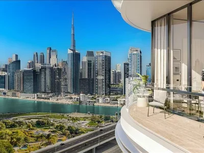 Residential complex High-rise residence Vento Tower with a swimming pool and a co-working area in the center of Dubai, Business Bay, UAE