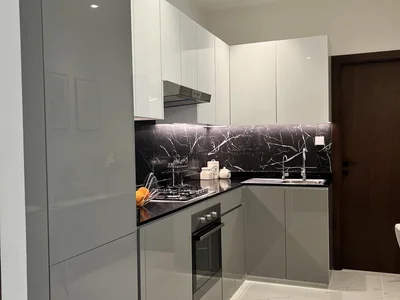 Zespół mieszkaniowy New complex of furnished apartments Maimoon Gardens with a swimming pool, a waterfall and sports grounds, JVC, Dubai, UAE
