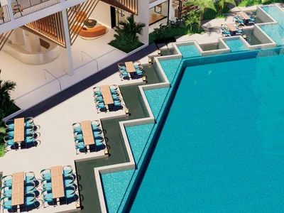 Wohnanlage Modern residential complex with a large swimming pool opposite a shopping center in Chalong, Phuket, Thailand