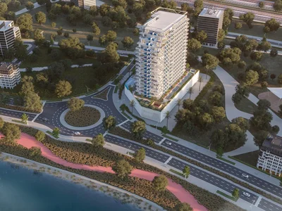 Residential complex New residence Samana Lake Views with swimming pools and lounge areas close to a highway, Production City, Dubai, UAE