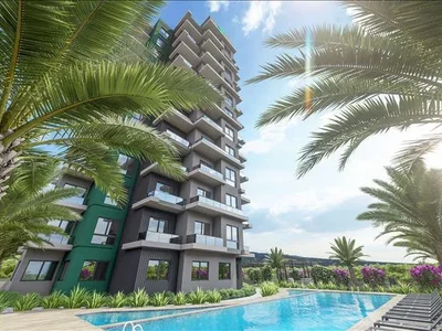 Zespół mieszkaniowy New residence with a swimming pool and gazeboes at 300 meters from the sea, Mersin, Turkey