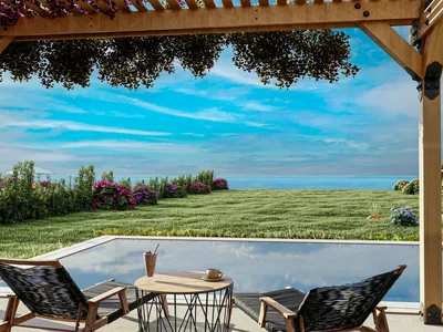 Apartment building NCP-117 Set directly on the seafront in Bahceli