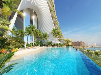 Zespół mieszkaniowy Como Residences — tall residential complex by Nakheel with artificial lakes and sandy beach in Palm Jumeirah, Dubai