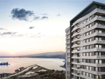Zespół mieszkaniowy New residence with a swimming pool at 300 meters from a metro station, Izmir, Turkey