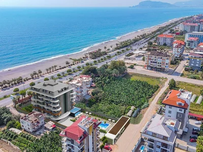Zespół mieszkaniowy New residential complex with swimming pools, a gym and a parking on the seafront, Kestel, Alanya, Türkiye