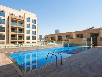 Zespół mieszkaniowy Complex of furnished apartments and townhouses Eleganz close to highways, JVC, Dubai, UAE