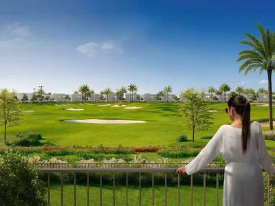 Complexe résidentiel New complex of luxury villas Fairway Villas with a golf course and restaurants, Emaar South, Dubai, UAE
