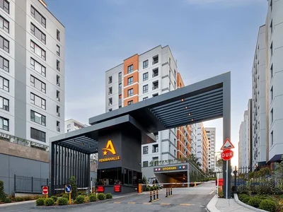 Zespół mieszkaniowy Luksusowe apartamenty z dwiema sypialniami w Avrupa Konutları Yenimahalle.